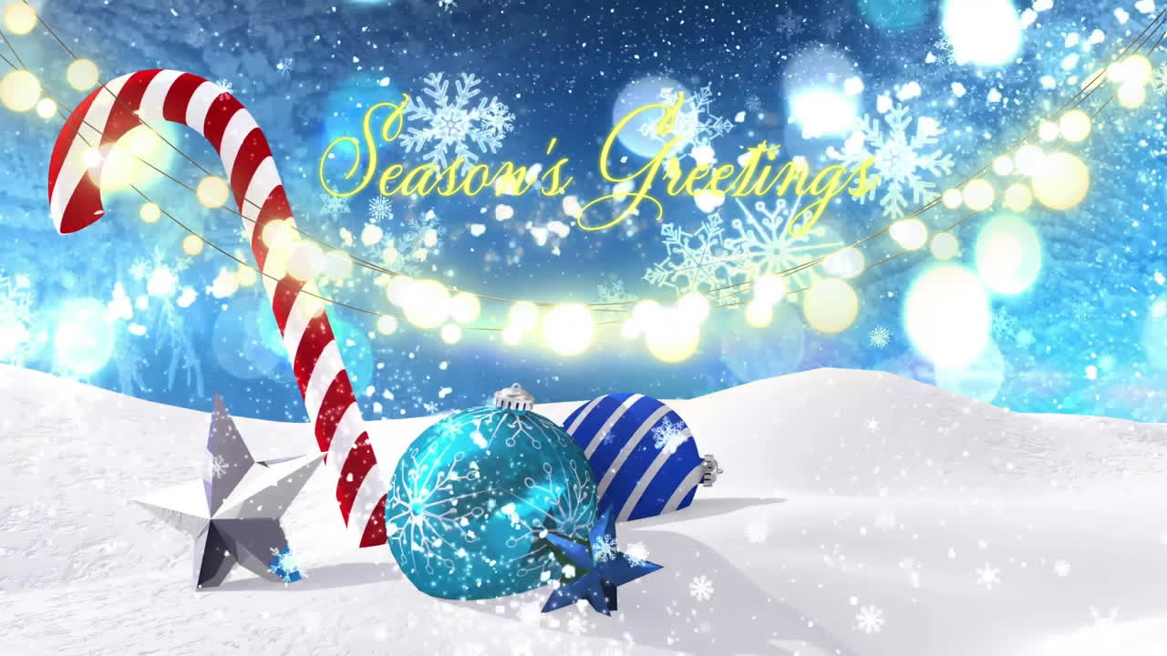 Season's Greetings text with festive ornaments and candy cane in snow