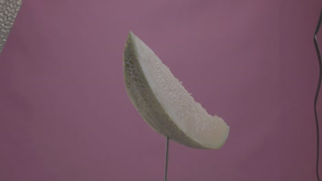 크로마 키를 위한 푸키아 스크린에 루프와 함께 회전하는 멜론