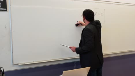 educator teaching integration formula in classroom