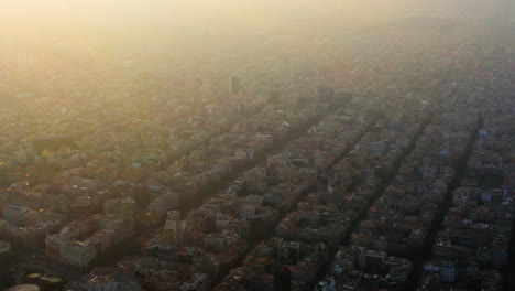 barcelona cityscape aerial view at sunset, spain
