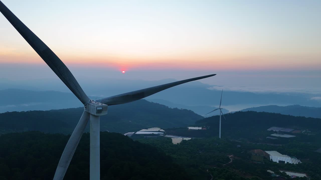 Wind turbines on beautiful hills in the morning sun - Vietnam