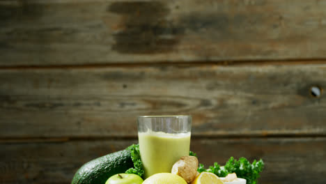 ingredients and vegetable smoothie on table 4k