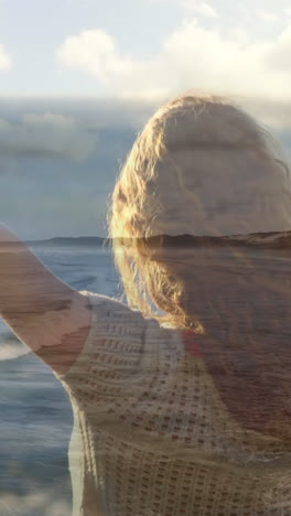 mujer disfrutando de la vista de la playa 4k