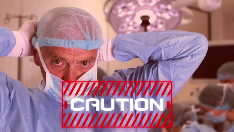 palabra de precaución escrita sobre los médicos que se ponen la máscara. la propagación de covid-19