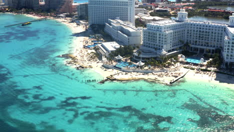 luxurious hotel resort on tropical beach with turquoise sea in cancún