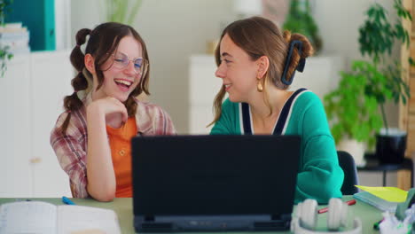 Mom-Supports-Her-Daughter-While-Doing-Her-Homework-for-School