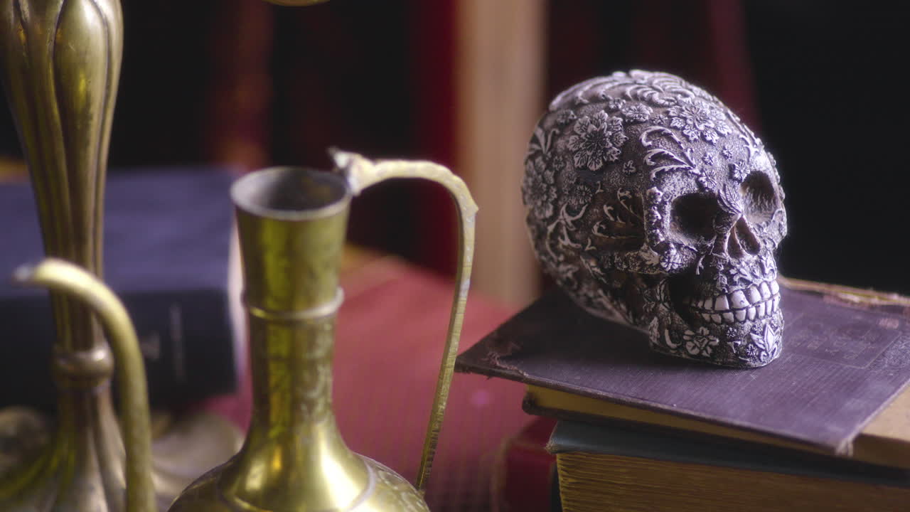 Dark Elegance: Renaissance-Inspired Setting with Skull, Books, and a Gilded Cup