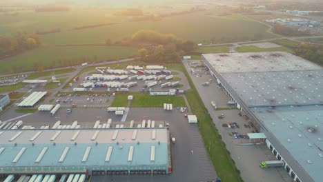 aerial shot on a logistics park with a warehouse - a loading hub