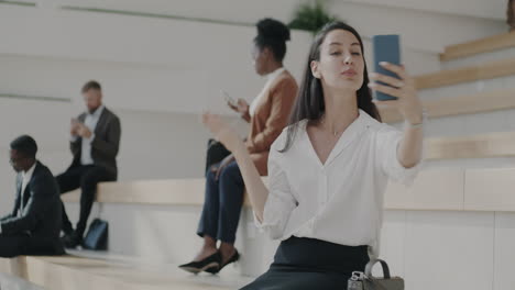 Businesswoman Making a Video Call in Modern Office