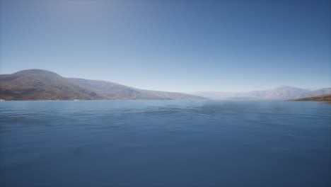 lake in hills on summer day