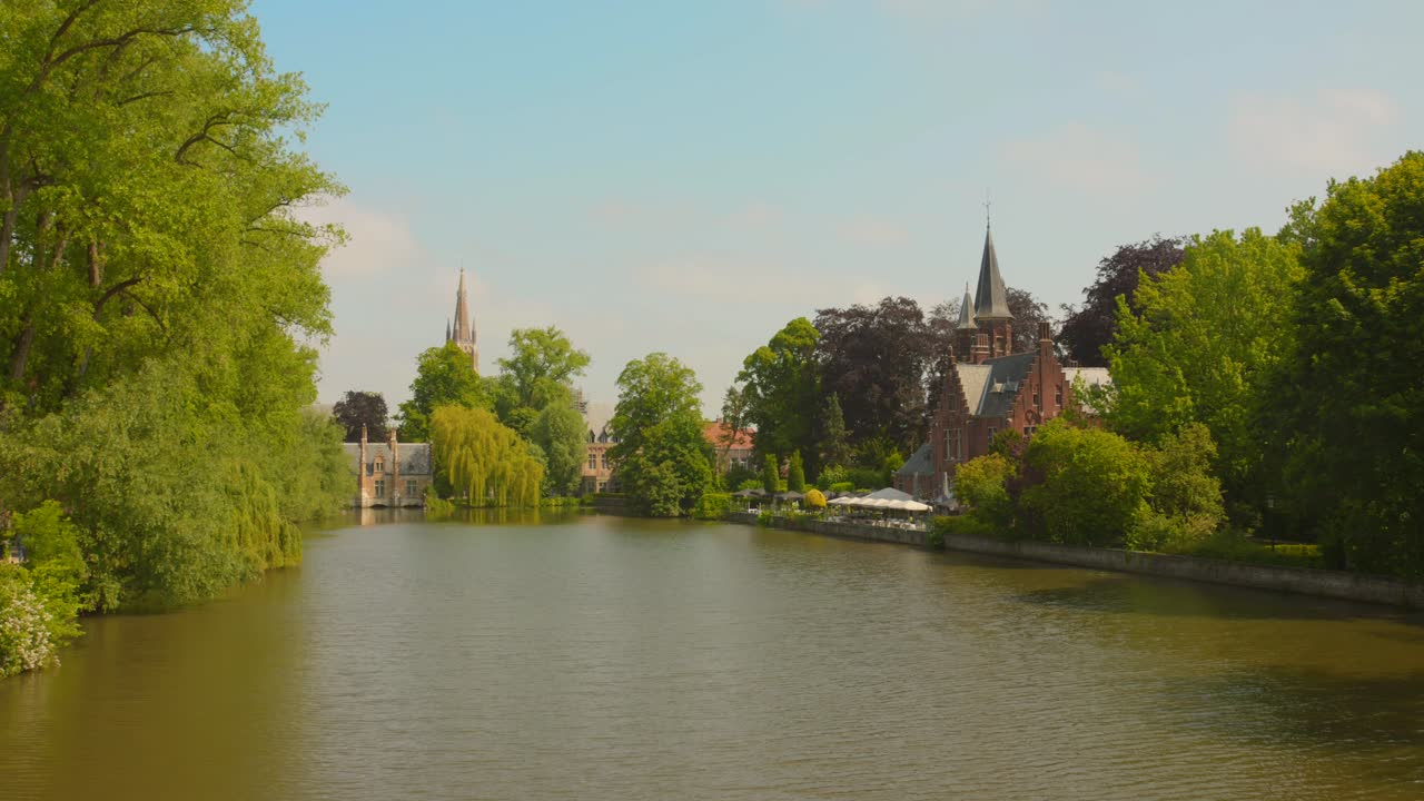 Minnewater &amp;quot;lake of love&amp;quot; in sunny day on canal in Bruges, Belgium