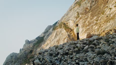 woman standing on a mountain top