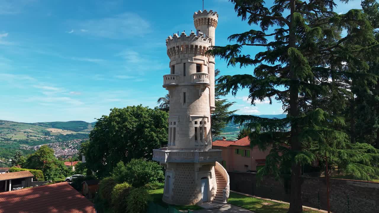 drone shot going closer to the tower of jealousy in Saint Martin la Plaine city in Loire departement, Auvergne Rhone Alpes region, France
