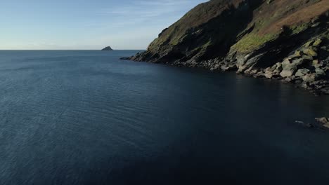 Coastal-erosion-of-the-cliffs-along-the-coastline,-drone-aerial-fly-over