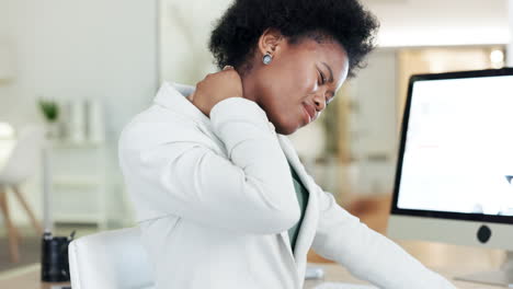 woman suffering with neck pain from long working