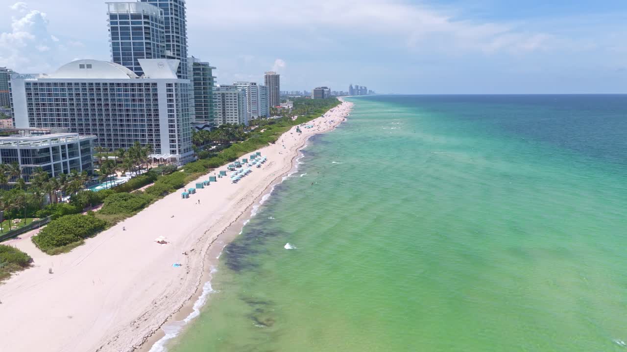 Miami Beach, hotels, white sand beach, Florida. Aerial forward, copy space