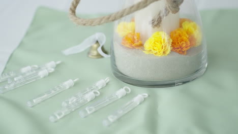 detailed shot decorated wedding table with flowers and bubbles for guests