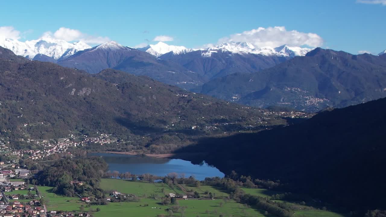 Stunning aerial view of the Alps in Italy showcasing green valleys