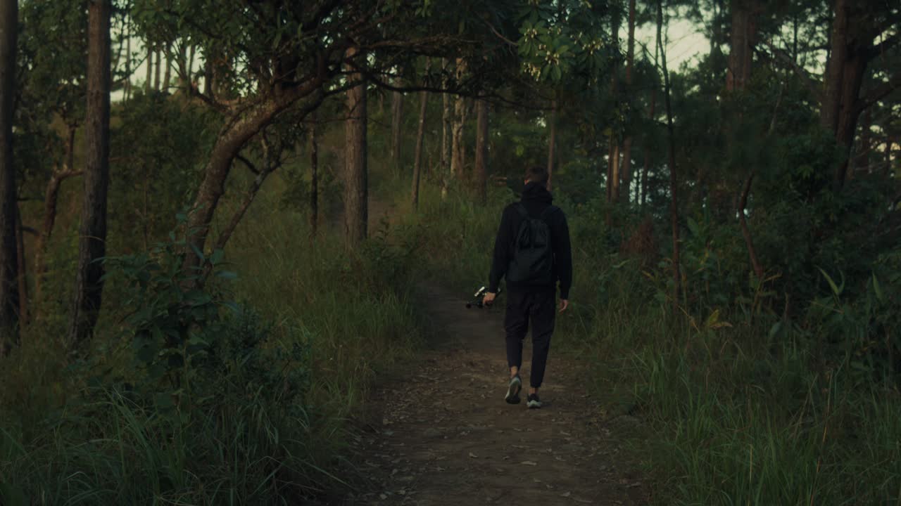 Man Vlogging in a Forest