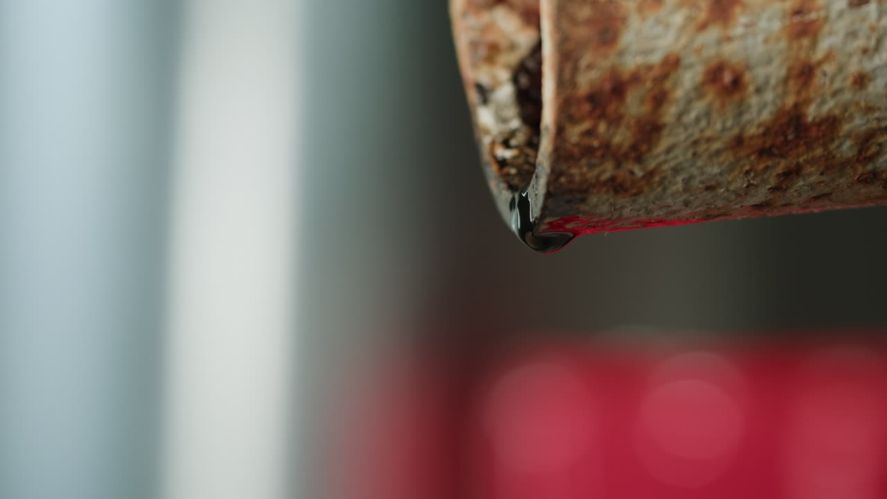 Rusty Pipe Dripping Water
