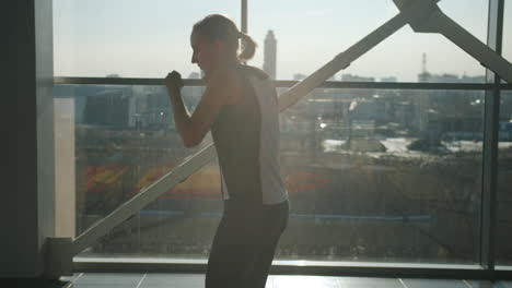 woman boxing workout in a modern gym