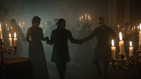 A Mysterious Gathering of Elegantly Dressed Figures in Candles&#039; Glow, Emphasizing the Haunting Atmosphere of a Darkened Room Filled with Intriguing Shadows and Masks