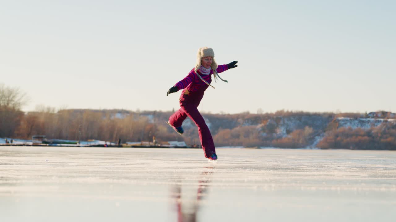 Woman ice skating on a frozen lake