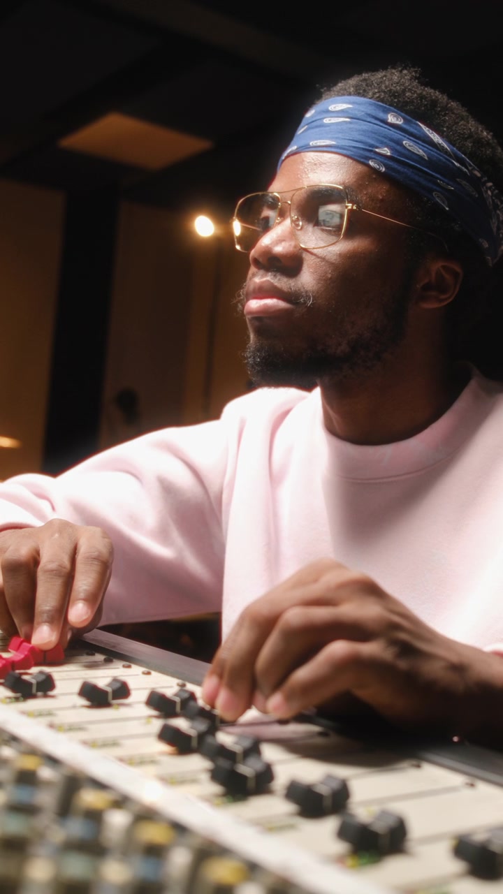 Creative Sound Designer Working on Music Track in Audio Studio