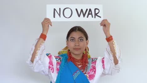 cinematic clip of a young brunette latin girl wearing the traditional outfit named cayambeñas showing up a message saying "no war