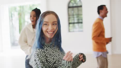 Happy-diverse-male-and-female-dancers-dancing-in-dance-studio,-slow-motion