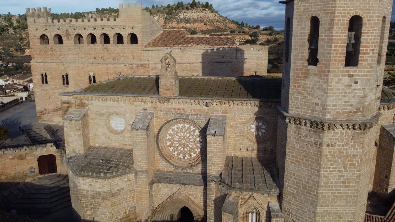4K Aerial Drone Shot Ascending Over Medieval Church and Castle in Spain
