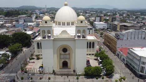 aerial orbits large white dome atop metro cathedral in san salvador