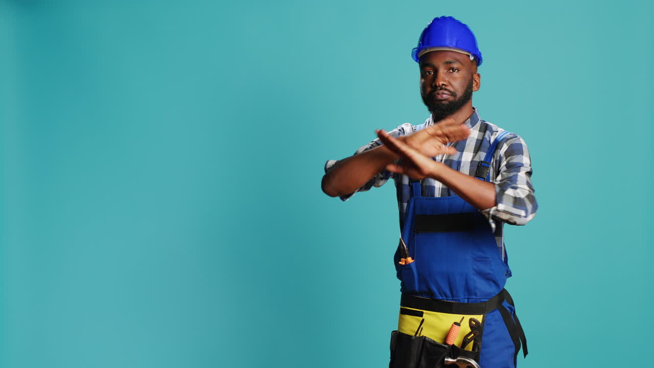 African american man expressing timeout gesture in studio