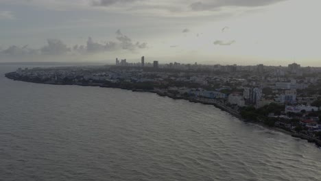 famous malecon of santo domingo and skyline on cloudy day, in dominican republic