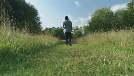 man walking lonely in the forest