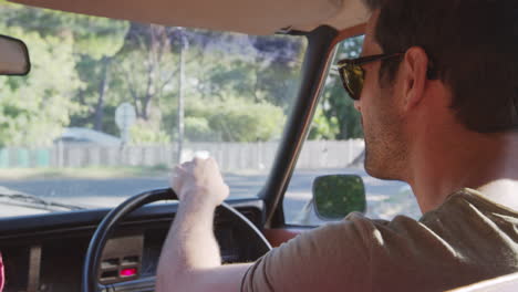 couple relaxing in car during road trip