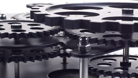 close up shot of  black gear cogs rotating