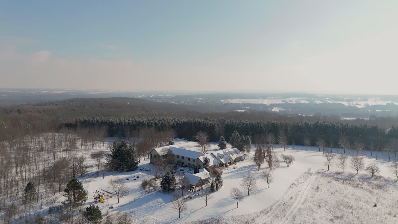 Mansion House On A Luxury Estate Surrounded By Forest During Winter At Sunrise In Canada, Aerial Shot.
