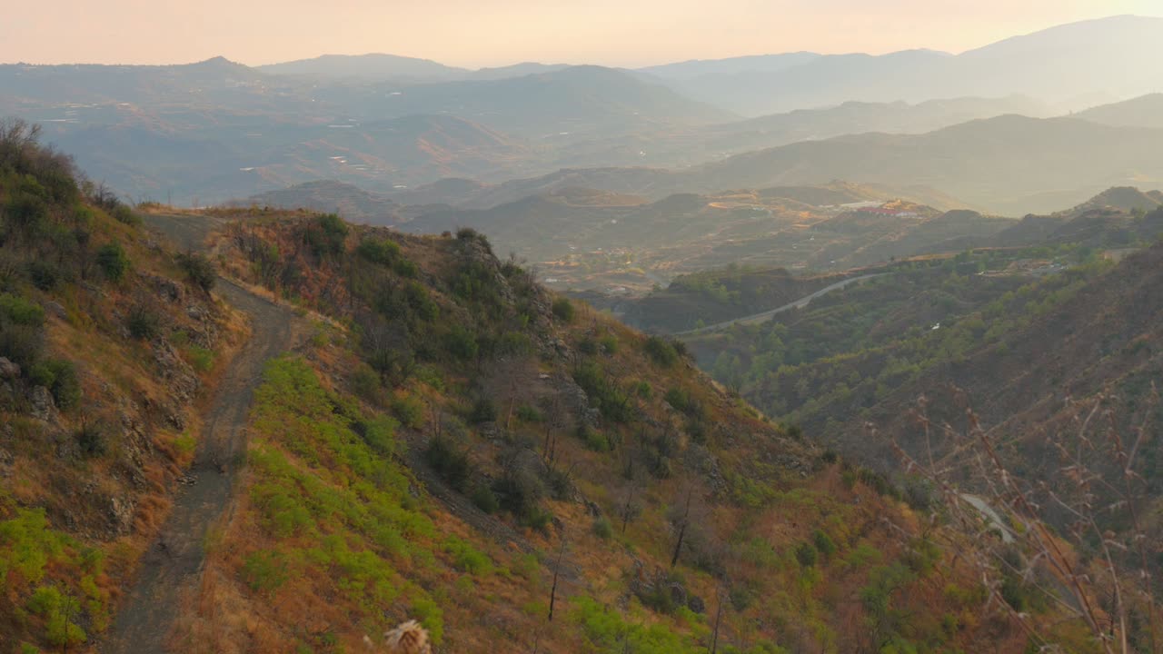 Profile view of Troodos mountains with foggy landscape in Cyprus.