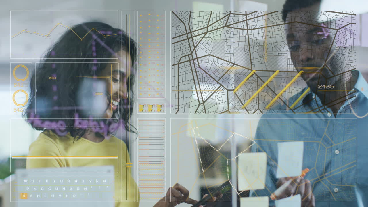 Interacting with digital interface, business professionals analyzing data and maps in office