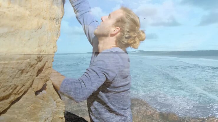 Animation of landscape over caucasian male hiker climbing
