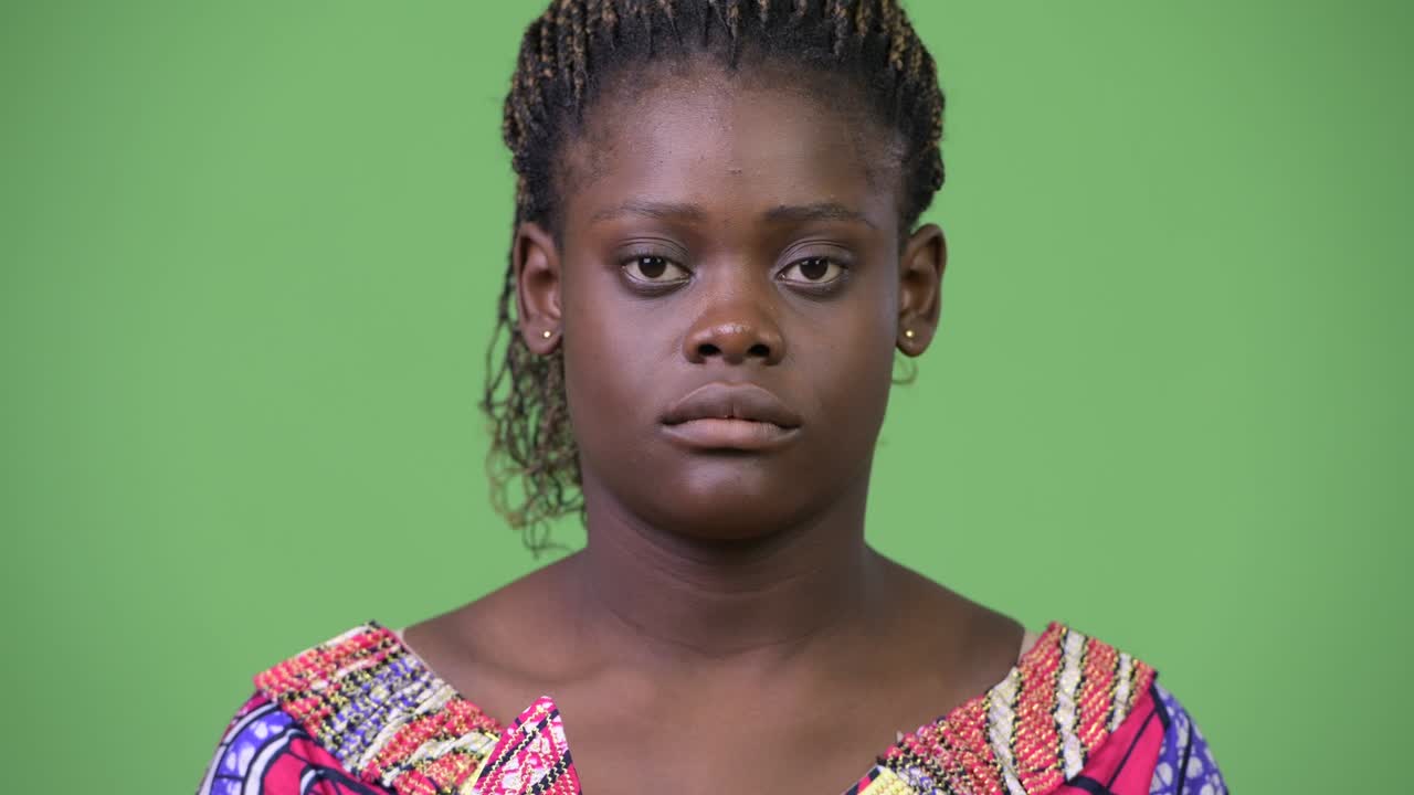 Young African woman doing three wise monkeys concept