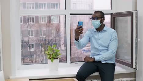 man on a video call in office