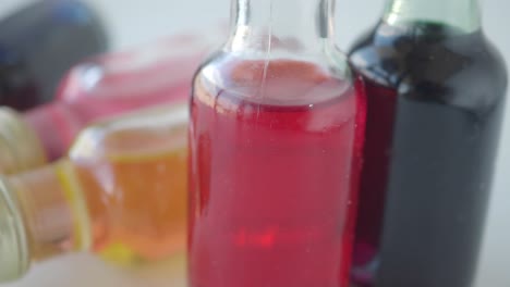 colorful small bottles with liquids