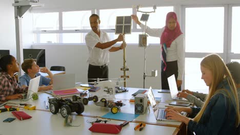 male and female pilot training about solar panel to kids 4k