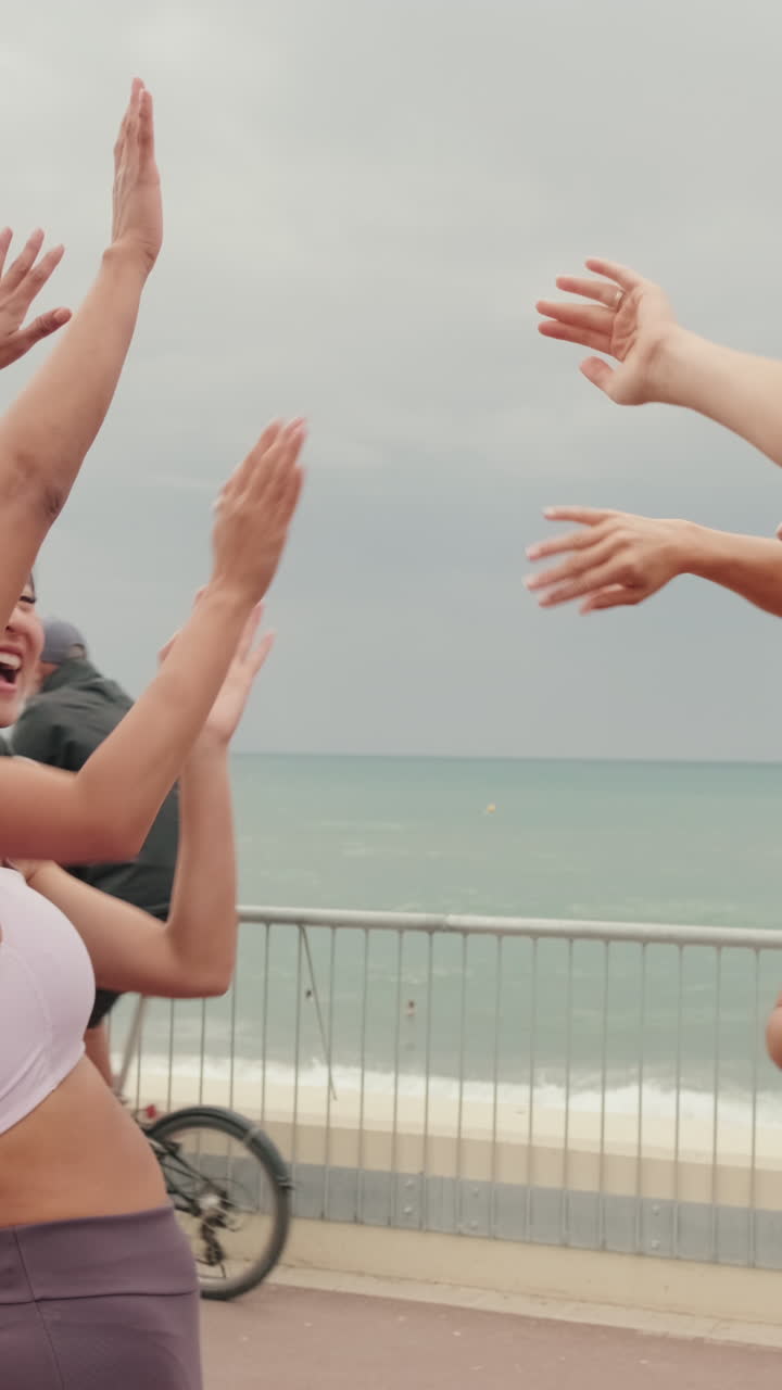 Friends Celebrate Fitness on Beach Boardwalk