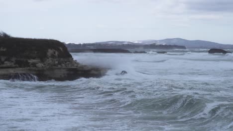 winter rocky sea coast in high wind and big waves-2