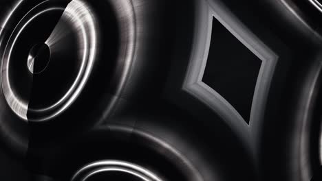 4k 3d seamless loop animation abstract pattern of circles with the effect of wave displacement. black and white chrome metal rings animation. abstract background for business presentation, vj loop.