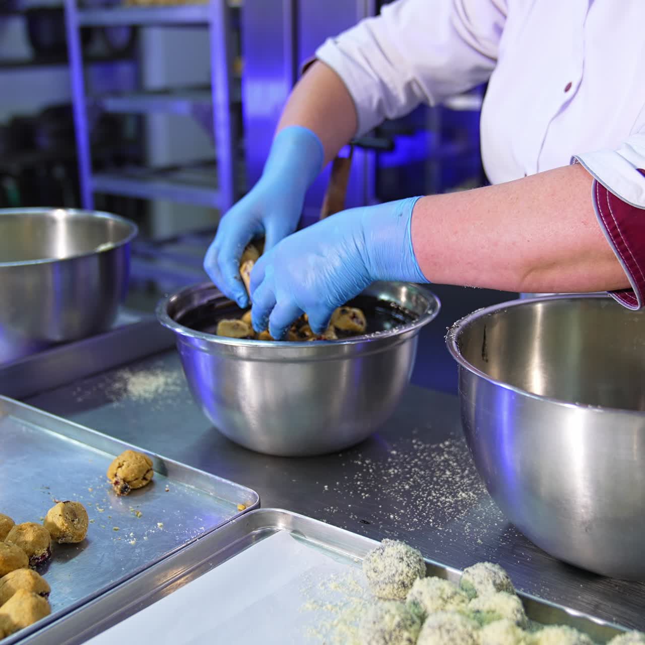 Baking concept sweet deserts. Baking specialist working with confectionery