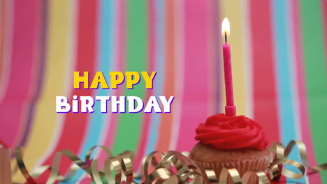 feliz cumpleaños escrito sobre cupcake y vela